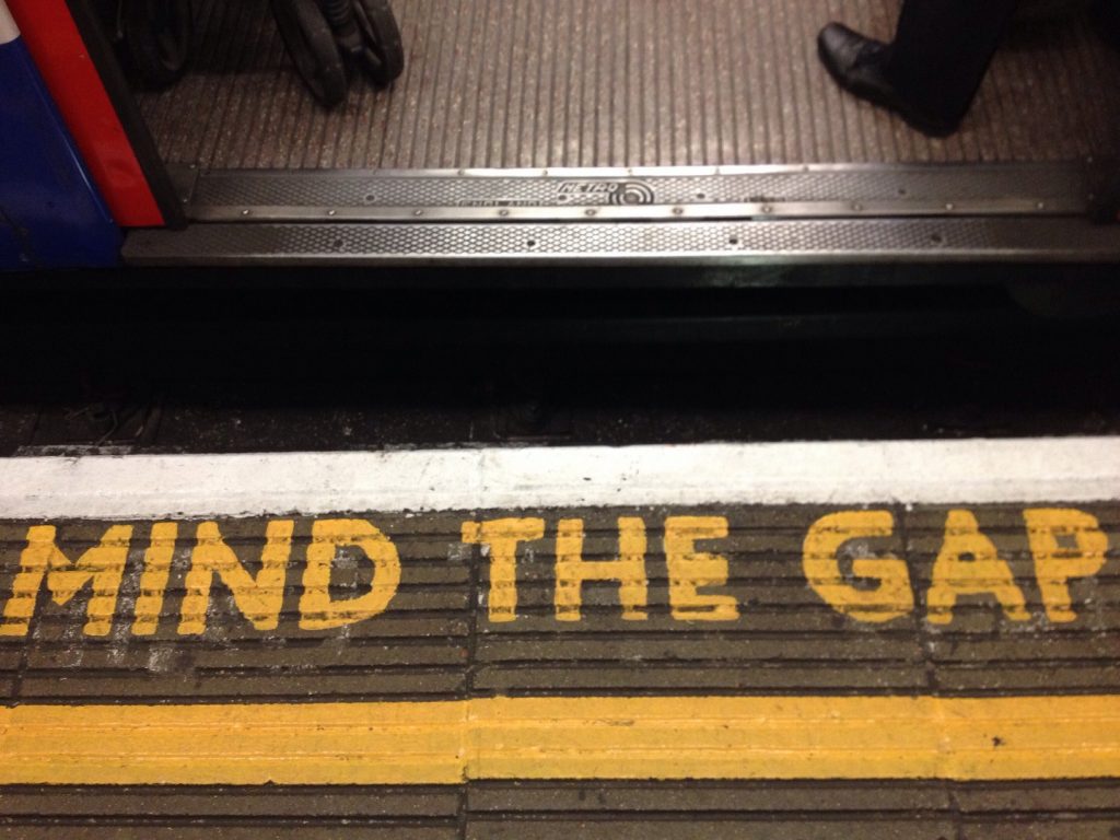 A "mind the gap" warning on a subway platform