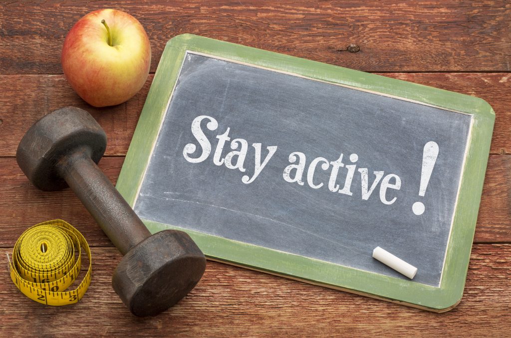 Chalkboard with a "Stay Active" message